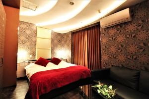 Letto o letti in una camera di Hotel Riviera Sagamihara (Adult Only)