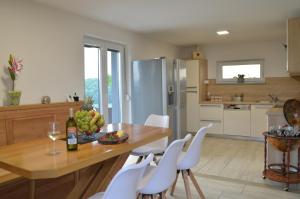 A kitchen or kitchenette at Tanja s Holiday Home in Nature with sauna and hot tub