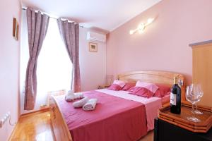 Voodi või voodid majutusasutuse Villa Tower Gardos toas