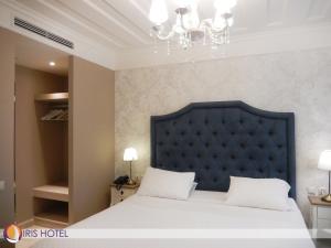 Ένα ή περισσότερα κρεβάτια σε δωμάτιο στο ΙΡΙΣ/IRIS