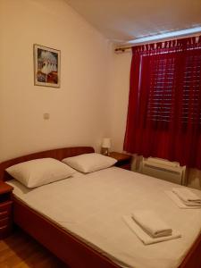 Cama o camas de una habitación en Apartments Čepo