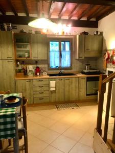 Kuchyň nebo kuchyňský kout v ubytování Il Priorato