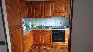 Kuchyň nebo kuchyňský kout v ubytování Intero appartamento "Al Gleno" + 4 fotografie