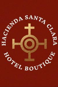 a red shirt with a sign that says santa clara united boutique at Hacienda Santa Clara, Morelos, Tenango, Jantetelco in Jantetelco