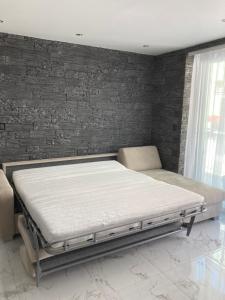 Posteľ alebo postele v izbe v ubytovaní Swiss Luxury Apartment