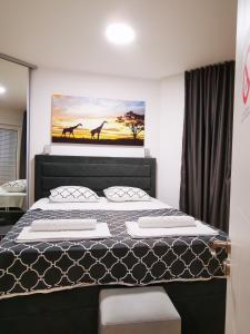 Krevet ili kreveti u jedinici u okviru objekta Merkur Luxury Apartman