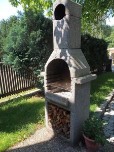 Vonkajšia záhrada v ubytovaní Apartmány Friday