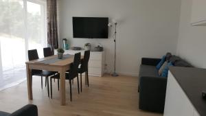 Kuchyň nebo kuchyňský kout v ubytování Morskie Wzgórze Apartamenty