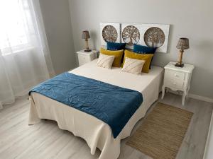 En eller flere senge i et værelse på Casal da Rita Campestre