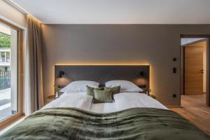 Postel nebo postele na pokoji v ubytování Maraias - Luxury Suites & Apartments