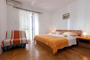 Кровать или кровати в номере Apartments Marino Gojak