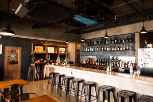 Lounge atau bar di MARINX CLASSIC HARBORVIEW PENSION