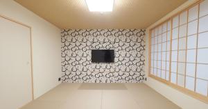 TV a/nebo společenská místnost v ubytování Hotel Abest Grande Takatsuki