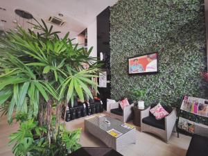 TV a/nebo společenská místnost v ubytování Prescott Hotel Bukit Bintang