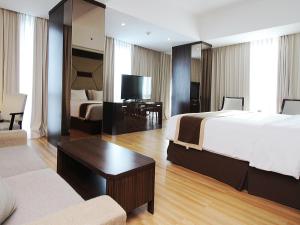 Java Palace Hotel tesisinde bir televizyon ve/veya eğlence merkezi