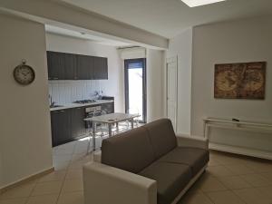 A kitchen or kitchenette at La Maison Latina Guest House