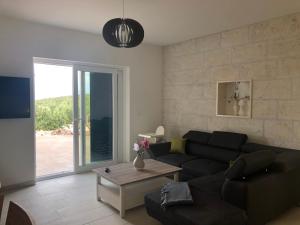 Χώρος καθιστικού στο Villa Luisa Pucisca - 2 Häuser, 6 Schlafzimmer Insel Brac - Pool, Grill, Kamin, Tischtennis, Boccia