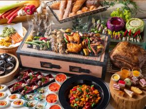 a buffet with a lot of different types of food at Midorinokaze Resort Kitayuzawa in Date