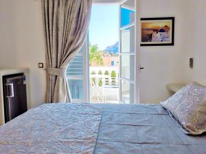 Letto o letti in una camera di Avraki