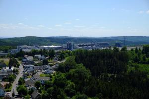 an aerial view of a town with trees and buildings at Ferienwohnungen Ilona Blick in Kelberg