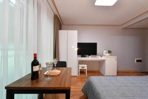 TV a/nebo společenská místnost v ubytování Naksanstay
