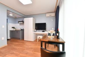 TV a/nebo společenská místnost v ubytování Naksanstay