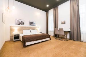 Ένα ή περισσότερα κρεβάτια σε δωμάτιο στο Neva Delta Hotel