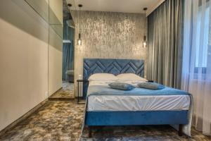 Postel nebo postele na pokoji v ubytování Hotel & Spa Biały Dom