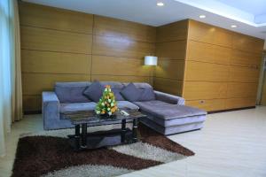 
a living room filled with furniture and a couch at Inter Luxury Hotel in Addis Ababa
