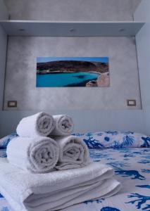 Lova arba lovos apgyvendinimo įstaigoje Bed and Breakfast Siciliamuri Lampedusa