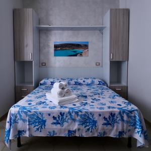 מיטה או מיטות בחדר ב-Bed and Breakfast Siciliamuri Lampedusa