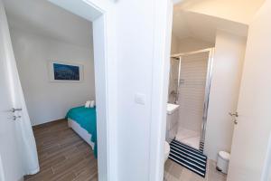 Kúpeľňa v ubytovaní APARTMANI VIGO + 37 fotografií