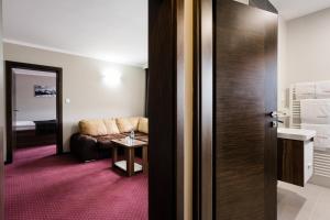 Kúpeľňa v ubytovaní Hotel Menhard