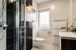 Kúpeľňa v ubytovaní Hotel Menhard