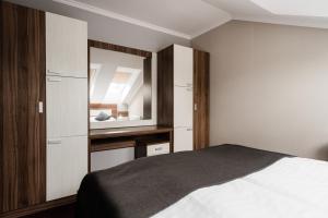 Posteľ alebo postele v izbe v ubytovaní Hotel Menhard