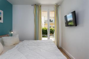 Postel nebo postele na pokoji v ubytování Villa Seeadler