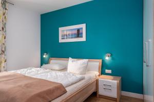 Postel nebo postele na pokoji v ubytování Villa Seeadler