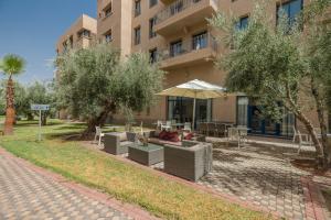 Aed väljaspool majutusasutust Wazo Appart-Hôtel