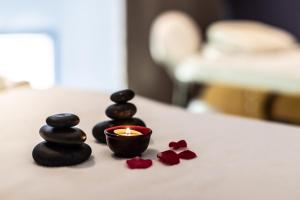 Voodi või voodid majutusasutuse Wazo Appart-Hôtel toas