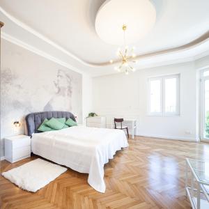 Posteľ alebo postele v izbe v ubytovaní ZACHÁR Apartman