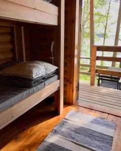 מיטה או מיטות בחדר ב-Koskenselkä Camping