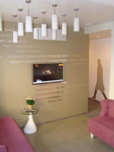 TV a/nebo společenská místnost v ubytování StanGret Hotel