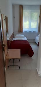 Tempat tidur dalam kamar di HOSTEL CPPI Nord