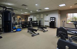 a gym with a lot of treadmills and machines at Staybridge Suites Orlando South, an IHG Hotel in Orlando