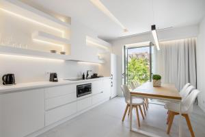 NS PLACE Modern Apartment Acropolis view tesisinde mutfak veya mini mutfak