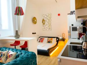 Postel nebo postele na pokoji v ubytování HomeSuite sul Lago