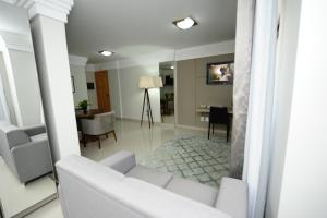 TV a/nebo společenská místnost v ubytování Hotel Saint Louis