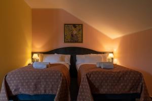 Posteľ alebo postele v izbe v ubytovaní Darovanský Dvůr - Wellness & Golf Hotel