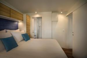 Maistra Camping Amarin Mobile homes客房内的一张或多张床位