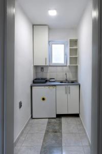 Ett kök eller pentry på Apartman Radjen